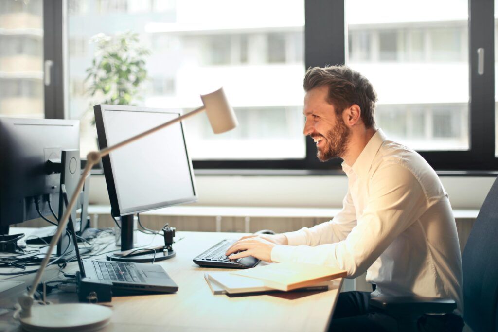 man at office desk