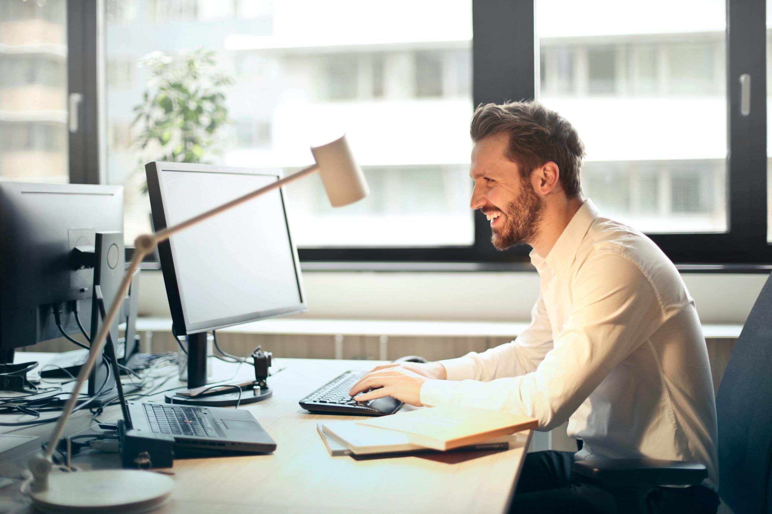 man at office desk